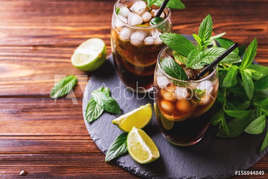 Picture of Cuba Libre cocktail with cola lime rum and peppermint